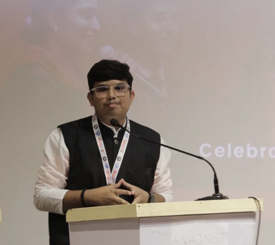 Pranshu Rajyaguru speaking at a national event